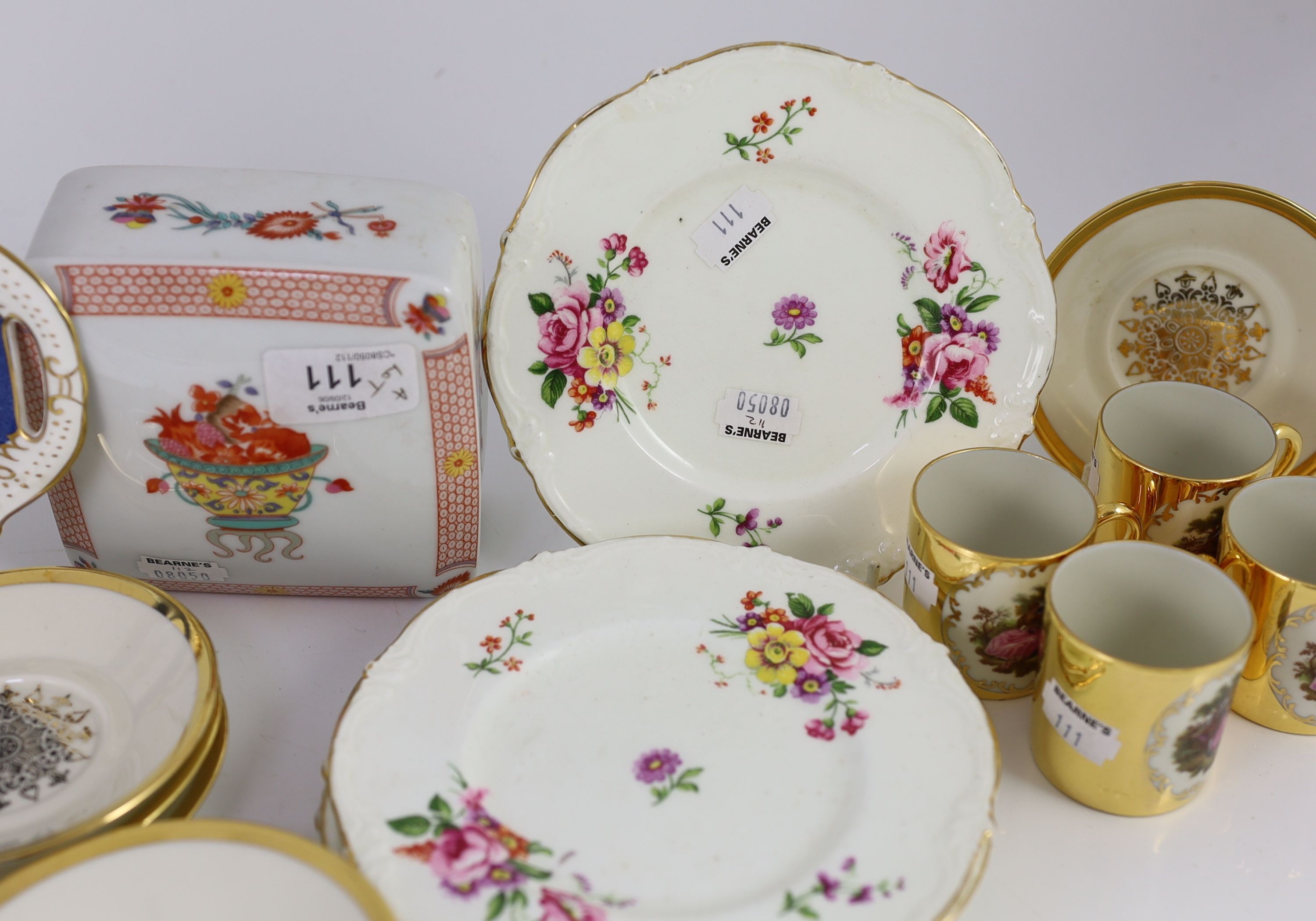 A set of eight German gold ground coffee cans and saucers